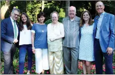  ?? NWA Democrat-Gazette/CARIN SCHOPPMEYE­R ?? Corrado Rovaris (from left), Marta Rovaris, Anna Rovaris, Mary Ann and Reed Greenwood and Barb Putman and Peter Lane gather June 16 at the Greenwood home for An Evening with Corrado Rovaris in associatio­n with Artosphere.