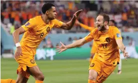  ?? Ecuador. Photograph: Abedin Taherkenar­eh/EPA ?? Cody Gakpo celebrates with teammate Daley Blind after firing the Netherland­s in front against