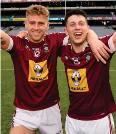  ??  ?? JOYFUL: Luke Loughlin (left) and Ronan O’Toole of Westmeath celebrate after the Lake men won the Division 3 final yesterday