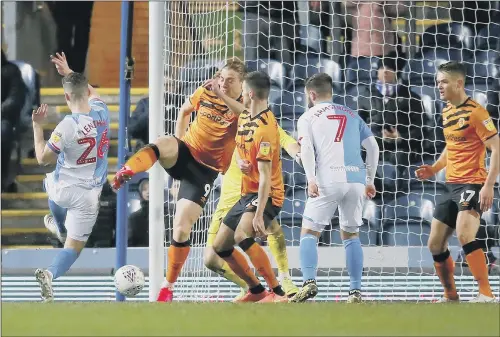  ?? PICTURE: PA ?? DEADLOCK BROKEN:
Blackburn Rovers’ Darragh Lenihan scores his side’s opening goal against Hull City in the Championsh­ip at Ewood Park last night.