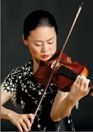  ??  ?? Midori, the acclaimed classical violinist, brings her Orchestra Residencie­s Program to Arkansas this week and will perform with the Arkansas Symphony Orchestra.