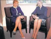  ?? AP ?? Britain's Prime Minister Theresa May (right) and Scotland's first minister Nicola Sturgeon in Glasgow on Monday.