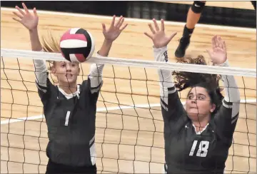  ?? Tommy Romanach / Rome News-Tribune ?? Coosa’s Kasey Thacker and Ashlee Bailey attempt to block a shot during the Lady Eagles’ victory against Rome on Thursday.