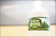  ?? Hearst Connecticu­t Media file photo ?? Nestle Waters North America has announced that it is converting its Poland Spring packaging to 100 percent recycled plastic.