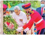  ?? PIC. COURTESY - PRESIDENT’S MEDIA ?? President Gotabaya Rajapaksa paying floral tribute in memory of war heroes at the foot of the cenotaph (Ranaviru Monument) at Battaramul­la Parliament ground last evening