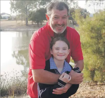  ?? ?? OPTIONS: A second pedestrian bridge over the Wimmera River at the end of Hamilton Street will give Horsham Holy Trinity Lutheran College student Charlotte Doyle, who turned 11 yesterday, and her father Glenn Doyle, who live on the river’s eastern bank, an easier path to school each morning. Picture: MICHAEL SCALZO