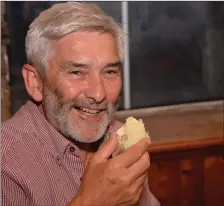  ??  ?? Finbarr McCarthy with one of the British Queens that won the title of best spud in Paróiste na Cille Cois Cnoic. Photo by Declan Malone