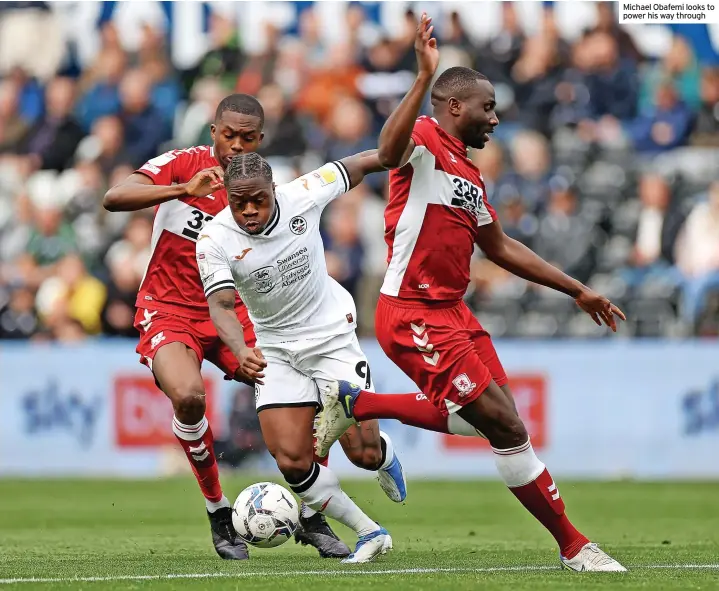  ?? ?? Michael Obafemi looks to power his way through