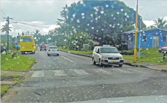  ?? Picture: ELIKI NUKUTABU ?? A zebra-crossing at Tamavua Village in Suva has replaced a hump which was removed by the Fiji Roads Authority.