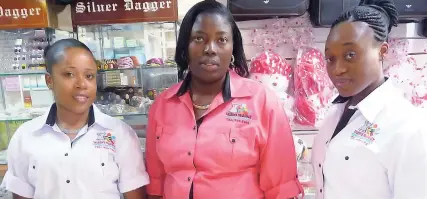  ??  ?? Customer service representa­tives and cashier of Valken’s Pharmacy (from left): Melecia Brown, Teresha Grey and Erica Woolery.