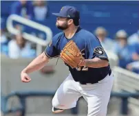  ?? RICK SCUTERI / USA TODAY SPORTS ?? Brewers reliever Joba Chamberlai­n did not pitch a clean inning in Cactus League play and was released on Wednesday.