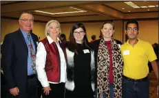  ?? NWA Democrat-Gazette/CARIN SCHOPPMEYE­R ?? Wayne Mackay (from left), Lona Robertson, Autumn Brown, Corrin Troutman and Juan Moscoso attend the Bentonvill­e Garden Club luncheon Nov. 20. Brown and Moscoso, horticultu­re majors, are garden club scholarshi­p recipients.