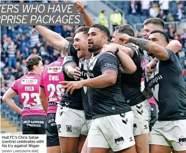  ?? DANNY LAWSON/PA WIRE ?? Hull FC’S Chris Satae (centre) celebrates with his try against Wigan