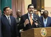  ?? DAVID SANTIAGO Miami Herald File ?? Sen. Manny Díaz Jr. speaks alongside Florida Gov. Ron DeSantis during a signing ceremony at William A. Kirlew Junior Academy, a Seventh-day Adventist K-8 school in Miami Gardens, on May 9, 2019.