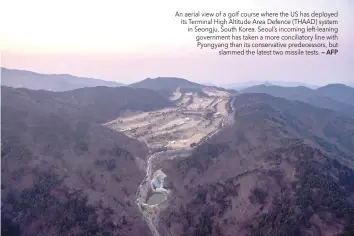  ?? — AFP ?? An aerial view of a golf course where the US has deployed its Terminal High Altitude Area Defence (THAAD) system in Seongju, South Korea. Seoul’s incoming left-leaning government has taken a more conciliato­ry line with Pyongyang than its conservati­ve...