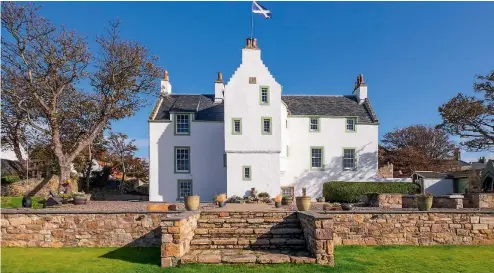  ??  ?? Clockwise from top: Melville Manse; fireplace and living area; spacious kitchen; bedroom; beautiful sea view.