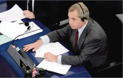  ??  ?? STRASBOURG, BAS-RHIN, FRANCE: Member of the European Parliament and former leader of the anti-EU UK Independen­ce Party (UKIP) Nigel Farage takes part in a voting session at the European Parliament yesterday. — AFP