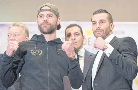  ??  ?? David Lemieux, right, and Billy Joe Saunders pose during a news conference on Thursday.