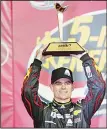  ??  ?? Jeff Gordon, driver of the #24 Axalta Coating Chevrolet, poses in victory lane after winning the NASCAR Sprint Cup Series 5-hour Energy 400 at Kansas Speedway on May 10, in
Kansas City, Kansas.