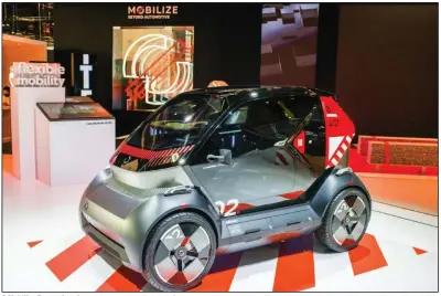  ?? (Bloomberg News/Nathan Laine) ?? A Mobilize Bento electric car, produced by Renault SA, is on display at the Viva Technology conference at Porte de Versailles exhibition center in Paris in June.