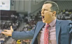  ?? PHOTOS BY GARY MOOK FOR THE NEW MEXICAN ?? RIGHT: Lobos coach Paul Weir had a tough return Friday to Las Cruces. The former Aggies coach, who left for the Lobos earlier this year, was called for a technical as UNM was hammered in Weir’s first game back in Las Cruces.