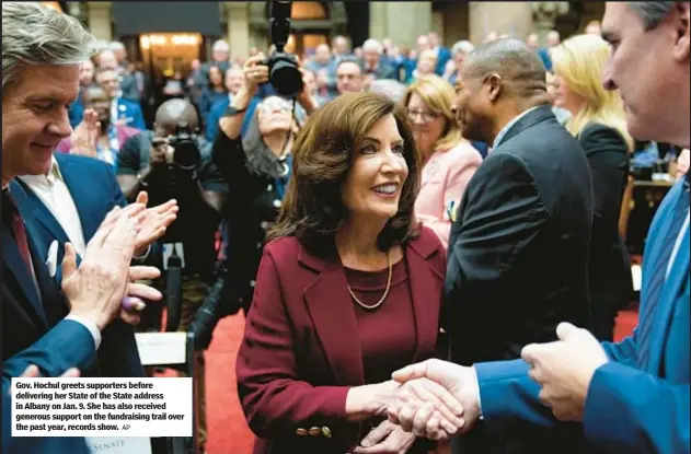  ?? AP ?? Gov. Hochul greets supporters before delivering her State of the State address in Albany on Jan. 9. She has also received generous support on the fundraisin­g trail over the past year, records show.