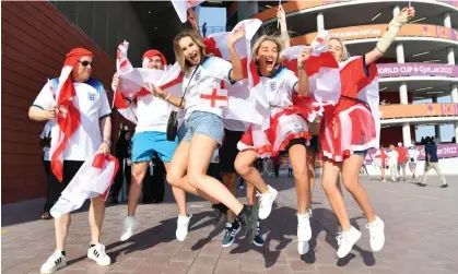  ?? Photograph: Stanley Anthony/ATP/SPP/Rex/Shuttersto­ck ?? Nor any drop to drink: England fans celebrate in Qatar.