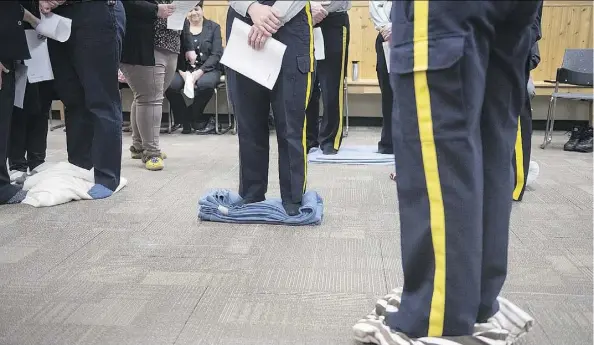  ?? FILES ?? RCMP cadets participat­e in the Kairos blanket exercise at the Depot Division in Regina in December.