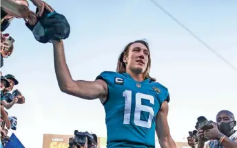  ?? AP ?? The Jacksonvil­le Jaguars made quarterbac­k Trevor Lawrence the first overall draft pick last year. Jacksonvil­le also holds the No. 1 overall pick this year.