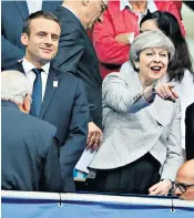  ??  ?? Theresa May with Emmanuel Macron, the French president, at last night’s friendly football match at the Stade de France