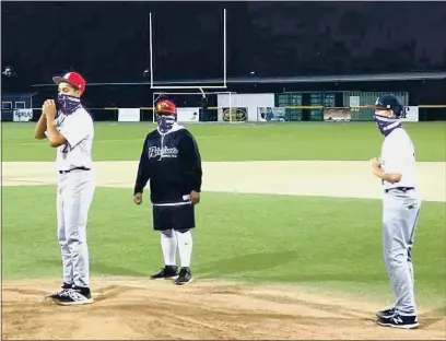  ?? CONTRIBUTE­D PHOTOS ?? Dede Mance (left) and Mason Runow (right) work out under the watchful eye of Admirals Baseball Coach Dyron Rolling at Vacaville Christian High School.