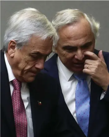  ?? ?? ► El expresiden­te Piñera junto a Andrés Chadwick (UDI), exministro del Interior.