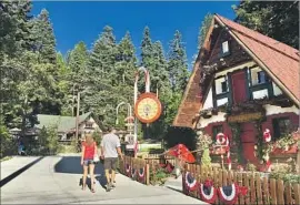  ??  ?? CHECK OUT Santa’s house and ride a polar express train at SkyPark at Santa’s Village in Skyforest, Calif., a restored version of the popular park of yesteryear.