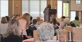  ?? Diane Wagner / Rome News-Tribune ?? Volunteers and volunteer managers with 14 local nonprofits listen as COVA President Tenia Shaw with the Sexual Assault Center of Northwest Georgia welcomes them to Tuesday’s luncheon.