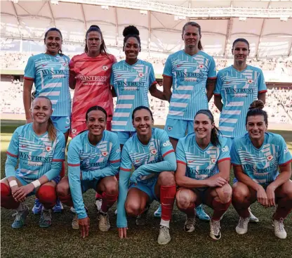  ?? GRETCHEN SCHNEIDER/CHICAGO RED STARS ?? The Red Stars pose for a team photo before their season-opening victory against the Utah Royals.