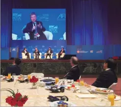  ??  ?? Guests at the 11th Asian Financial Forum keep themselves focused on the participan­ts during one of the panel discussion­s held on Tuesday.