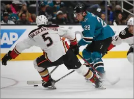  ?? NHAT V. MEYER — BAY AREA NEWS GROUP ?? The Sharks' Timo Meier (28) skates against the Ducks' Urho Vaakanaine­n (5) in the third period at SAP Center in San Jose on Tuesday.