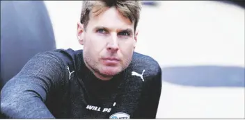  ?? AP PHOTO/AJ MAST ?? Will Power, of Australia, sits on the track before the Indianapol­is 500 auto race at Indianapol­is Motor Speedway in Indianapol­is, May 29, 2022.