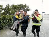  ?? PHOTO: MARTIN DE RUYTER/ STUFF ?? Lionel Wells, 97, was rescued by police officers when his home was surrounded by seawater during excyclone Fehi on February 1.