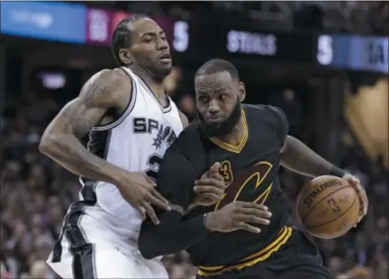  ?? TONY DEJAK — THE ASSOCIATED PRESS FILE ?? The 76ers were unable to sign free agent LeBron James, right, or trade for Kawhi Leonard, left, this offseason.