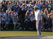  ?? ASHLEY LANDIS — THE ASSOCIATED PRESS ?? Scottie Scheffler celebrates after a birdie on the 18th hole during the third round at the Masters at Augusta National Golf Club on Saturday in Augusta, Ga.