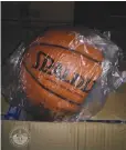  ??  ?? THIS BASKETBALL marked with the Spalding brand is among the fake goods seized by the Bureau of Customs.