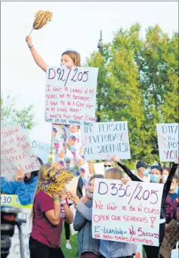  ?? JEFF VORVA/DAILY SOUTHTOWN ?? Students from the Lockport area form a small pyramid during the rally in Orland Park.