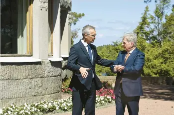  ?? MARKKU ULANDER/LEHTIKUVA ?? Finnish President Sauli Niinisto, right, meets with NATO Secretary-General Jens Stoltenber­g.