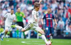  ?? — AFP ?? Real Madrid’s Luka Modric controls the ball during the Spanish league match against Levante at the Santiago Bernabeu stadium in Madrid.