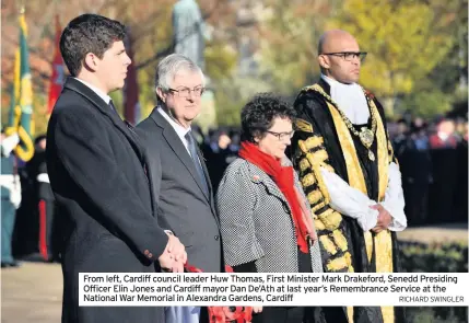  ?? RICHARD SWINGLER ?? From left, Cardiff council leader Huw Thomas, First Minister Mark Drakeford, Senedd Presiding Officer Elin Jones and Cardiff mayor Dan De’Ath at last year’s Remembranc­e Service at the National War Memorial in Alexandra Gardens, Cardiff