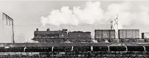  ??  ?? Right: A great ‘over-the-wall’ shot of ‘G2a’ No. 49002 passing
Edge Hill on February 18, 1961, with a goods train heading for Liverpool.