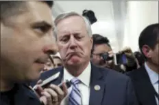  ?? ALEX BRANDON — THE ASSOCIATED PRESS ?? House Freedom Caucus Chairman Rep. Mark Meadows, R-N.C. reacts to a reporter’s question on Capitol Hill in Washington, Thursday following a Freedom Caucus meeting. GOP House leaders delayed their planned vote on a long-promised bill to repeal and...
