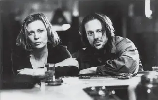  ?? Cannon Films ?? “BARFLY” is peak Mickey Rourke in a year that represente­d crest of his stardom. Here, he plays an alcoholic writer drinking his way across East Hollywood. Faye Dunaway plays his fellow lush.