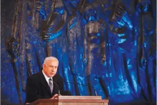  ?? (Marc Israel Sellem/the Jerusalem Post) ?? PRIME MINISTER Binyamin Netanyahu speaks at the state ceremony marking Holocaust Remembranc­e Day at Yad Vashem last night.